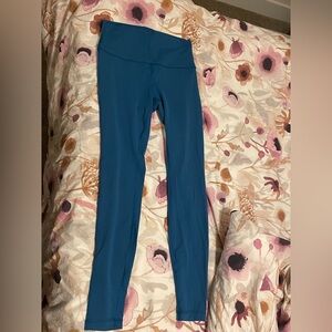Never worn lululemon wunder train high rise tight 28” in capri blue. Size 8.